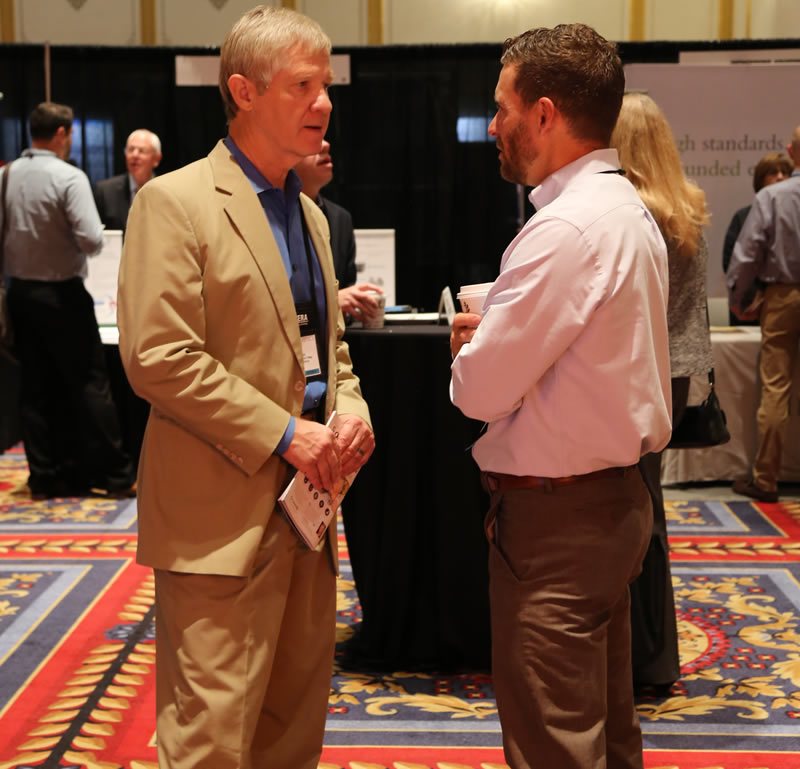 Jeremy Stelter speaks with a client at CGP 2018.